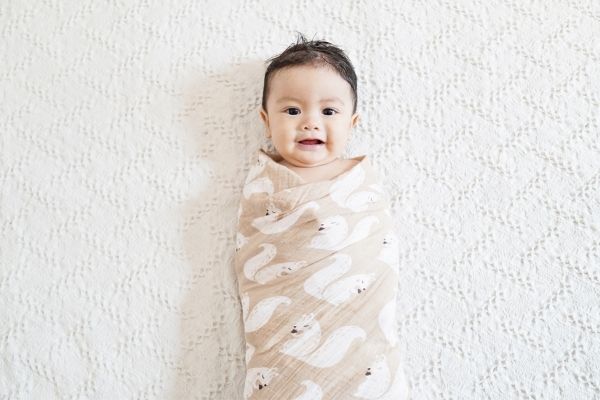 how long should you swaddle baby
